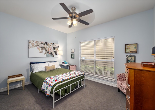 1015 W Bluff St, Fort Worth, TX 76102 - carpeted bedroom with a ceiling fan and baseboards