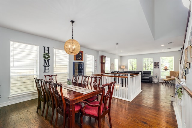 1015 W Bluff St, Fort Worth, TX 76102 - dining room featuring dark wood-style floors, recessed lighting, a chandelier, and baseboards
