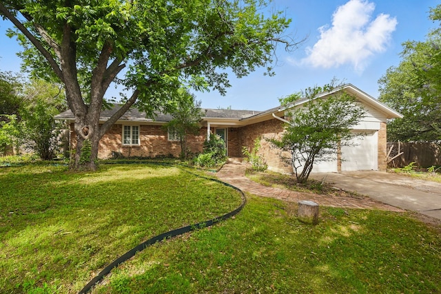 4900 Vega Ct E, Fort Worth, TX 76133 - ranch-style home featuring driveway, an attached garage, and brick siding