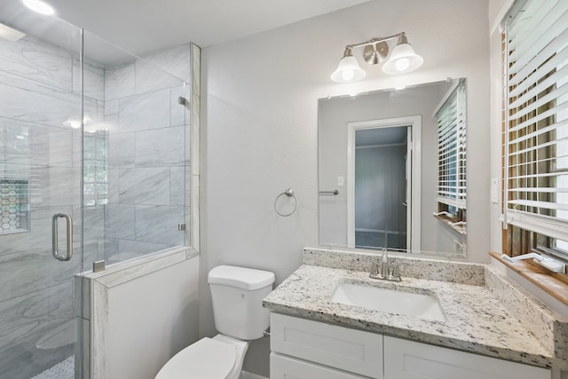 4900 Vega Ct E, Fort Worth, TX 76133 - bathroom with toilet, vanity, and a shower stall
