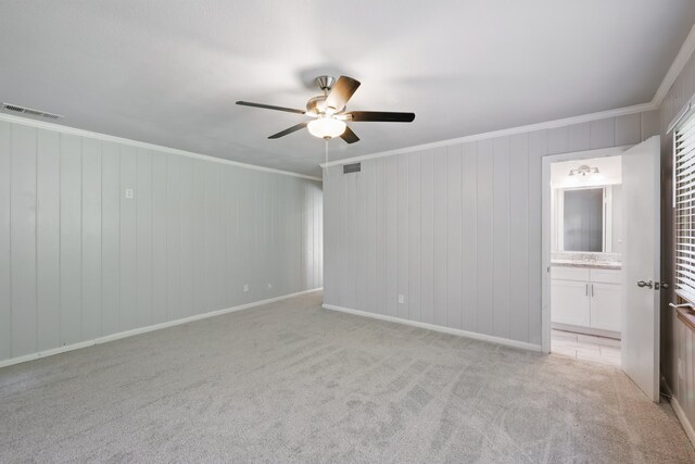 4900 Vega Ct E, Fort Worth, TX 76133 - spare room with a ceiling fan, light colored carpet, and crown molding