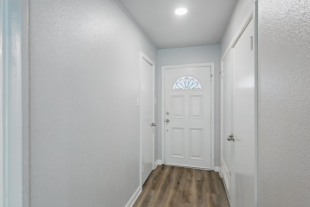 4900 Vega Ct E, Fort Worth, TX 76133 - doorway featuring dark wood finished floors and baseboards