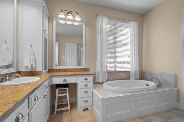 8920 Cypress Creek Rd, Lantana, TX 76226 - bathroom with vanity, a bath, healthy amount of natural light, and tile patterned floors