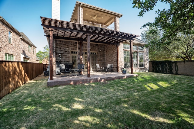 8920 Cypress Creek Rd, Lantana, TX 76226 - rear view of house featuring a ceiling fan, brick siding, a balcony, and a patio area