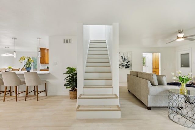 4104 Middlebrook Rd, Fort Worth, TX 76116 - living room featuring light wood finished floors, stairway, ceiling fan, and baseboards