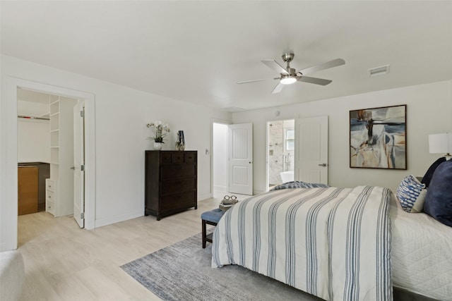4104 Middlebrook Rd, Fort Worth, TX 76116 - bedroom featuring light wood finished floors, baseboards, a ceiling fan, and a spacious closet