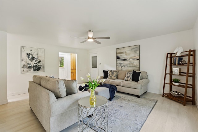 4104 Middlebrook Rd, Fort Worth, TX 76116 - living area with light wood-style floors, a ceiling fan, and baseboards