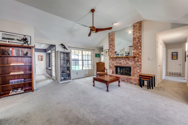 4500 Keys Dr, The Colony, TX 75056 - living area with vaulted ceiling, a ceiling fan, carpet flooring, and a brick fireplace