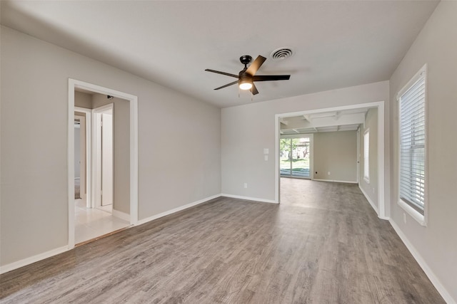 1822 Roberts Cut Off Rd, Fort Worth, TX 76114 - spare room with wood finished floors, ceiling fan, and baseboards