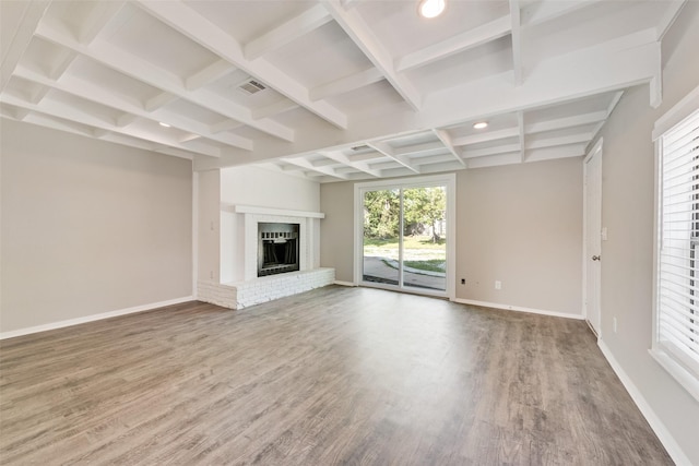 1822 Roberts Cut Off Rd, Fort Worth, TX 76114 - unfurnished living room featuring coffered ceiling, wood finished floors, baseboards, beamed ceiling, and a brick fireplace
