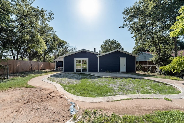 1822 Roberts Cut Off Rd, Fort Worth, TX 76114 - back of property with a patio area