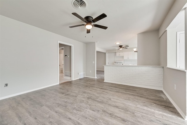 1822 Roberts Cut Off Rd, Fort Worth, TX 76114 - unfurnished living room with a ceiling fan, wood finished floors, and baseboards