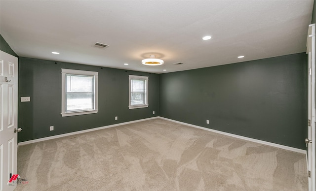 9472 Ranch Ln, Shreveport, LA 71106 - spare room featuring light colored carpet, baseboards, and recessed lighting