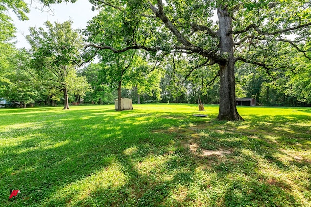 9472 Ranch Ln, Shreveport, LA 71106 - view of grassy yard with view of wooded area