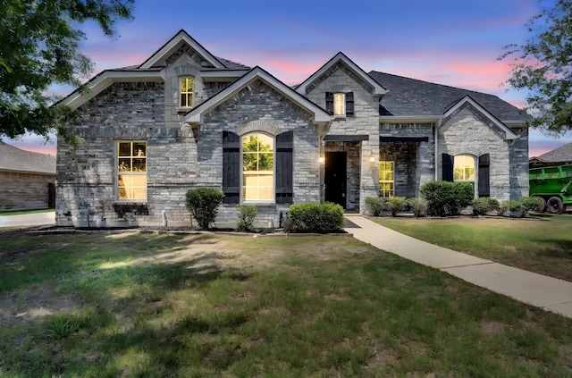 211 Debbie Way, Red Oak, TX 75154 - french provincial home with a front lawn and stone siding