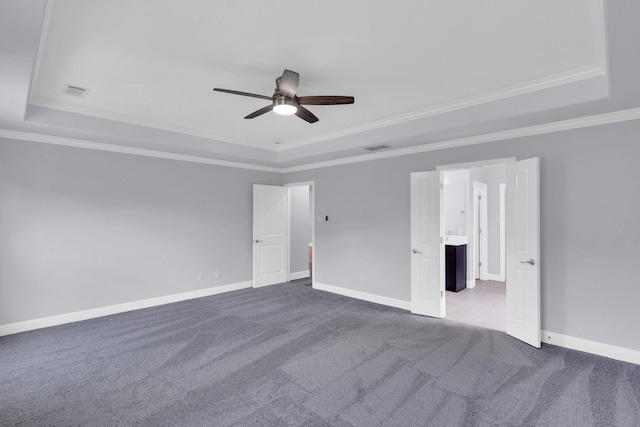 211 Debbie Way, Red Oak, TX 75154 - unfurnished bedroom featuring a raised ceiling, ornamental molding, carpet flooring, baseboards, and a ceiling fan