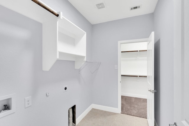 211 Debbie Way, Red Oak, TX 75154 - laundry area with hookup for an electric dryer, washer hookup, hookup for a gas dryer, baseboards, and tile patterned flooring