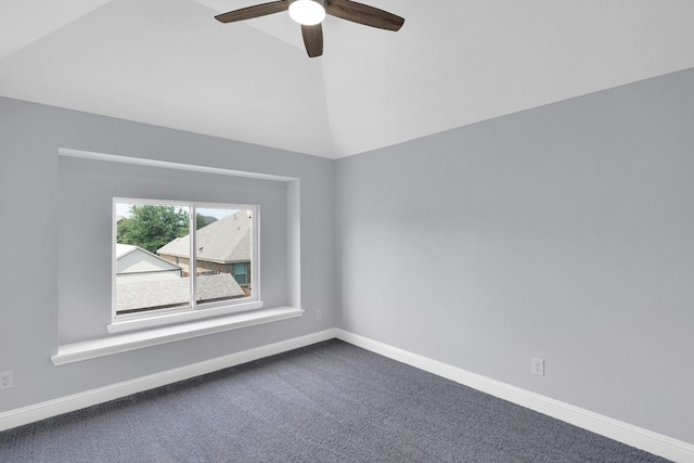 211 Debbie Way, Red Oak, TX 75154 - empty room with dark carpet, a ceiling fan, baseboards, and lofted ceiling