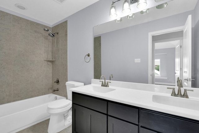211 Debbie Way, Red Oak, TX 75154 - bathroom featuring toilet, double vanity, shower / washtub combination, and tile patterned floors