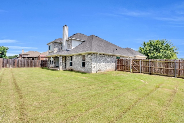 211 Debbie Way, Red Oak, TX 75154 - back of property featuring a chimney, a shingled roof, and brick siding