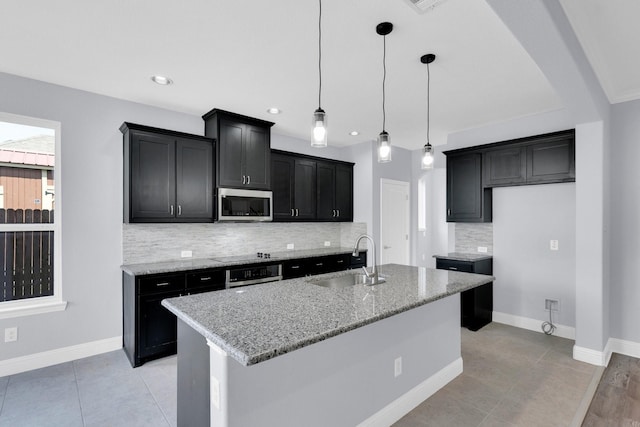211 Debbie Way, Red Oak, TX 75154 - kitchen with a sink, stainless steel microwave, backsplash, black electric cooktop, and oven