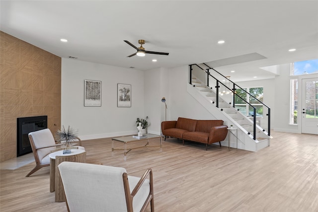 3717 Estacado Ln, Plano, TX 75025 - living room with recessed lighting, stairs, baseboards, a fireplace, and light wood-style floors