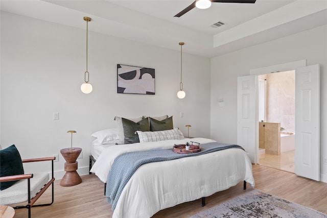 3717 Estacado Ln, Plano, TX 75025 - bedroom featuring light wood-type flooring, ensuite bath, baseboards, and a ceiling fan