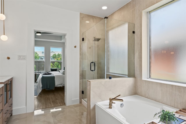 3717 Estacado Ln, Plano, TX 75025 - full bath featuring a garden tub, a stall shower, connected bathroom, and vanity