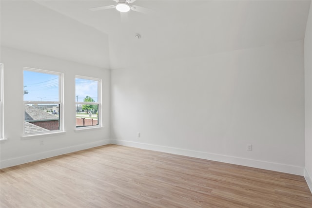 3717 Estacado Ln, Plano, TX 75025 - empty room with light wood-type flooring, baseboards, ceiling fan, and vaulted ceiling