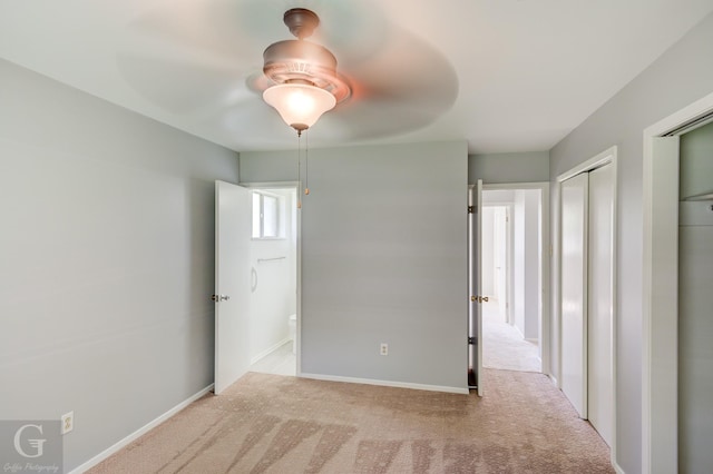 3422 Lanell Dr, Bossier City, LA 71112 - unfurnished bedroom with carpet flooring, baseboards, ceiling fan, and two closets