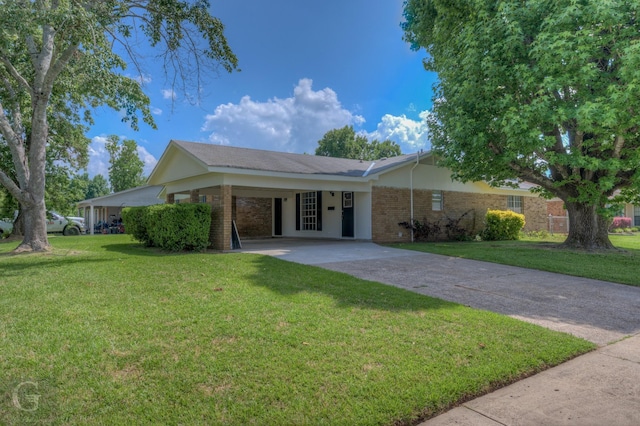 3422 Lanell Dr, Bossier City, LA 71112 - ranch-style house with concrete driveway, brick siding, a front lawn, and a carport