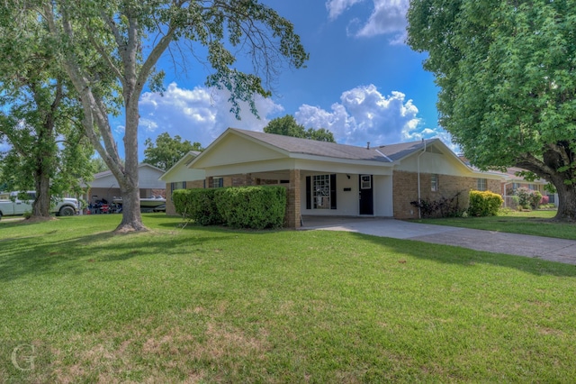 3422 Lanell Dr, Bossier City, LA 71112 - ranch-style house with concrete driveway, a front lawn, an attached carport, and brick siding
