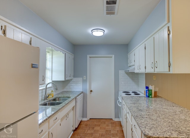 3422 Lanell Dr, Bossier City, LA 71112 - kitchen with white appliances, a sink, decorative backsplash, and white cabinetry