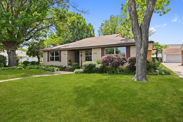 11138 Wyatt St, Dallas, TX 75218 - single story home featuring brick siding, a front lawn, and a garage