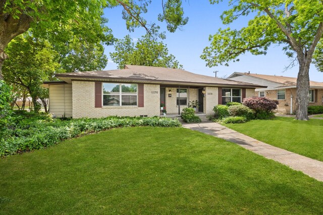 11138 Wyatt St, Dallas, TX 75218 - ranch-style house featuring brick siding and a front yard