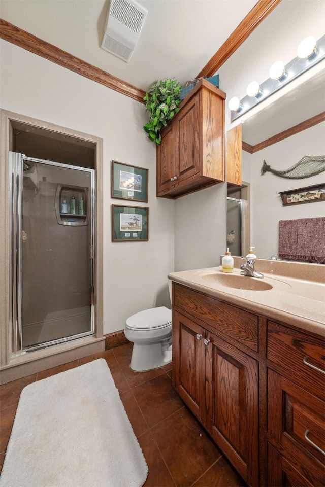 311 County Road 1710, Clifton, TX 76634 - full bathroom featuring ornamental molding, vanity, toilet, a stall shower, and tile patterned floors