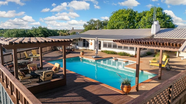 311 County Road 1710, Clifton, TX 76634 - view of swimming pool featuring a hot tub, a pergola, a wooden deck, and a patio area
