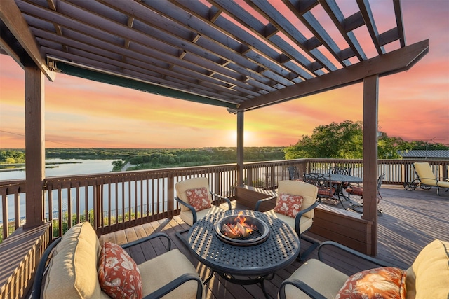 311 County Road 1710, Clifton, TX 76634 - wooden deck with an outdoor fire pit, outdoor dining space, a water view, and a pergola