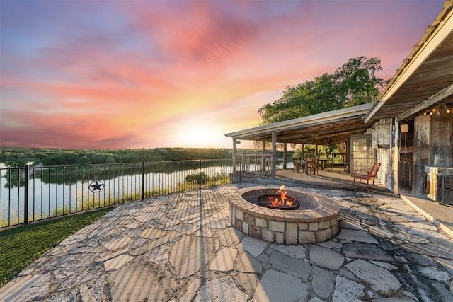 311 County Road 1710, Clifton, TX 76634 - view of patio / terrace featuring an outdoor fire pit and a water view