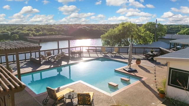 311 County Road 1710, Clifton, TX 76634 - view of swimming pool with a patio area, a water view, and an outdoor living space