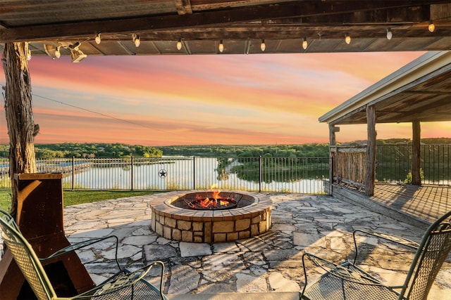 311 County Road 1710, Clifton, TX 76634 - view of patio / terrace featuring an outdoor fire pit and a water view