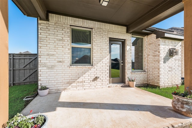 6314 Catalpa Dr, Venus, TX 76084 - property entrance with a patio and brick siding