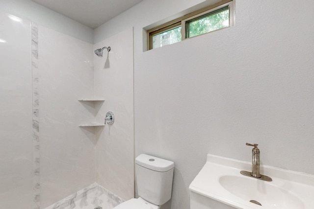 6725 Lovett Ave, Dallas, TX 75227 - bathroom with toilet, a shower, marble finish floors, and vanity