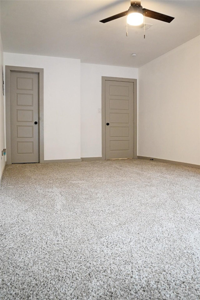 7810 Larchridge Dr, Dallas, TX 75232 - unfurnished room featuring a ceiling fan, baseboards, and speckle patterned floor