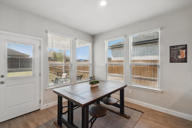 120 Texasage St, Rhome, TX 76078 - dining space with baseboards, wood finished floors, and recessed lighting