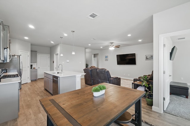 120 Texasage St, Rhome, TX 76078 - dining area with light wood-type flooring, recessed lighting, ceiling fan, and baseboards