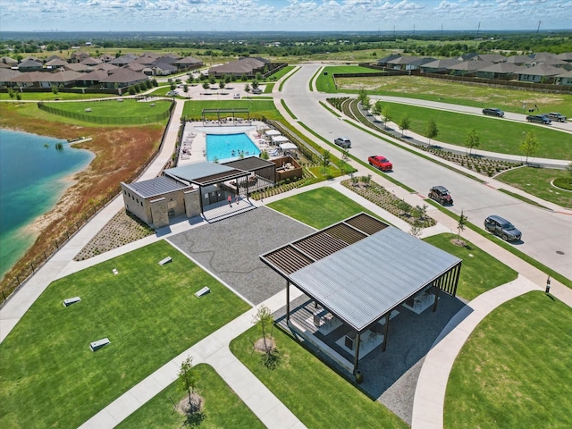120 Texasage St, Rhome, TX 76078 - aerial view of residential area featuring a pool and a large body of water