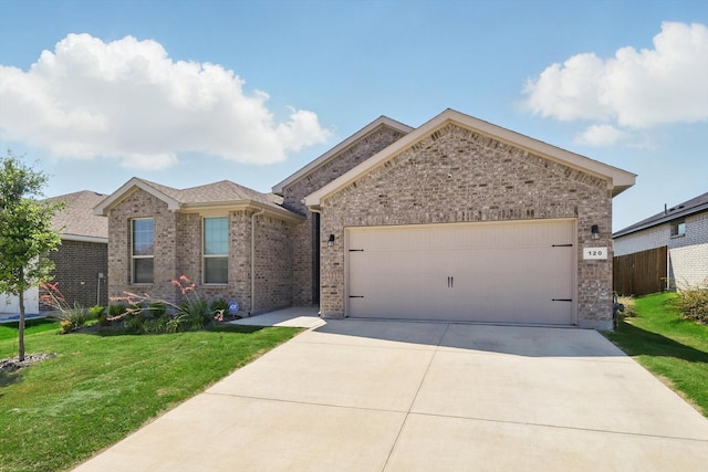 120 Texasage St, Rhome, TX 76078 - ranch-style home with brick siding, concrete driveway, a front yard, and an attached garage