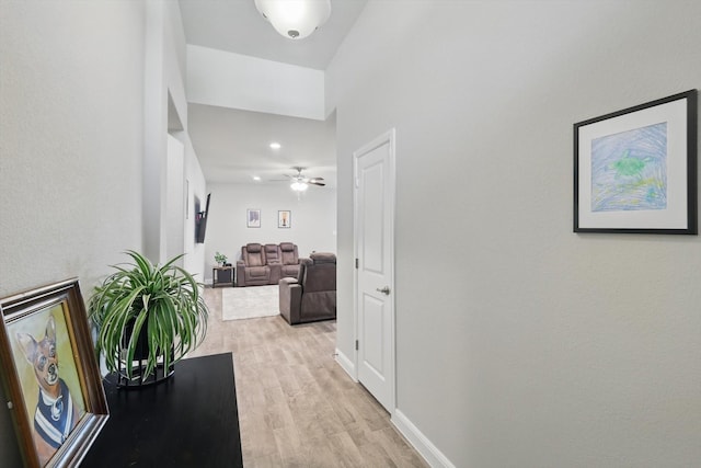120 Texasage St, Rhome, TX 76078 - corridor with light wood-style flooring, baseboards, and recessed lighting