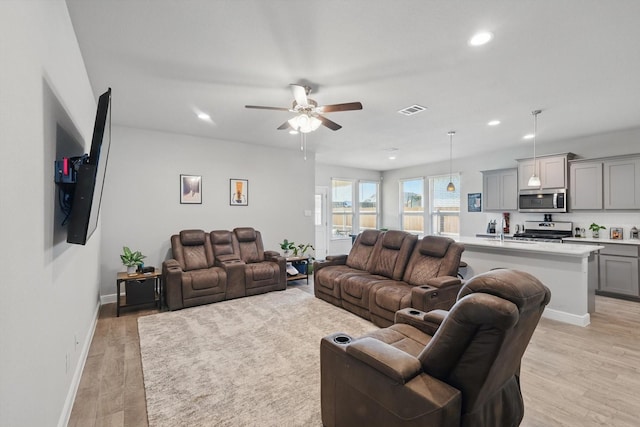 120 Texasage St, Rhome, TX 76078 - living area with recessed lighting, light wood-style flooring, baseboards, and a ceiling fan